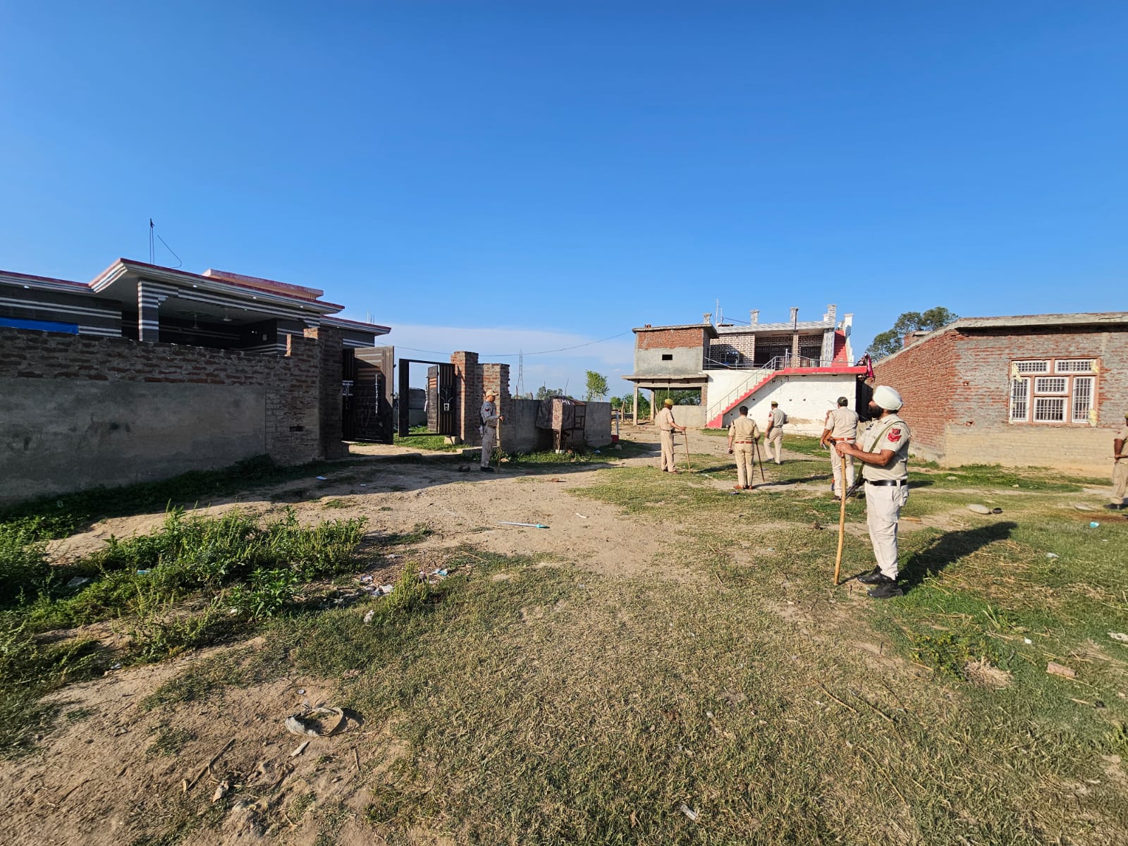 POLICE RAIDS THE HOUSE OF GULZAR AHMED @LAHU, at CHAK WAZIRU BISHNAH